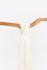 wool tied to a stick